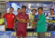 Penyerahan piala kepada juara minisoccer Pekan Olahraga PC Wates